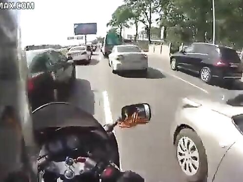 Cyclist Destroys His Bike While Trying To Beat Traffic Jam