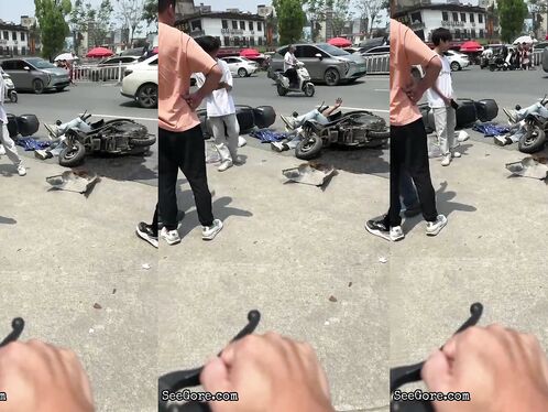 Bicyclist Without Helmet Knocks Down Other Cyclist At Intersection