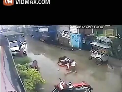 Girl Involved In Funny Two-wheeler Accident - Video - VidMax Co