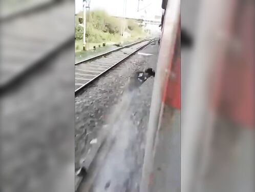 Idiot Near The Train