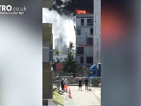 Man Escapes Burning Building By Grabbing Crane Hook