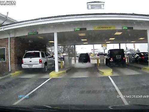 The SUV Accelerated Out Of The Bank Driveway And Took Off.