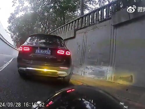 Beijing Photographer Pinned To Wall By SUV