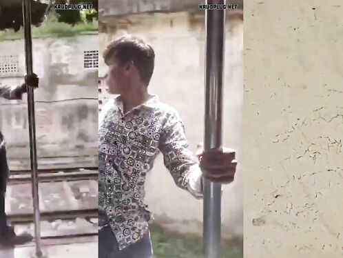 Young Man Hanging On Concrete Column