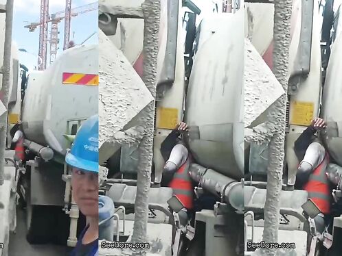 Man Trapped Between Trucks