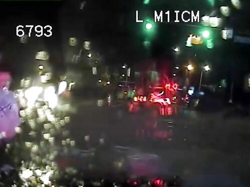 Seattle Patrol Car Stopped At Intersection