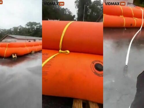 Homeowners Place Giant Floats Around Their Property To Prevent Flooding