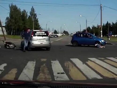 Terrifying Moment Cyclist Falls Face First Onto Asphalt
