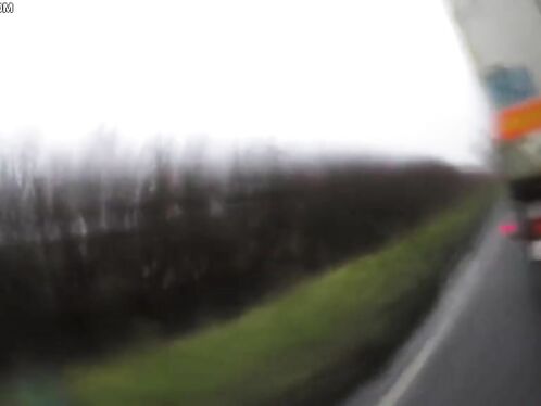 Cyclist Thrown Onto Grass After Collision With Truck