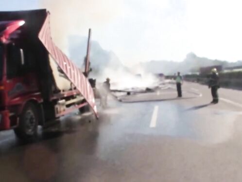 Truck Catches Fire After Colliding With Parked Vehicle