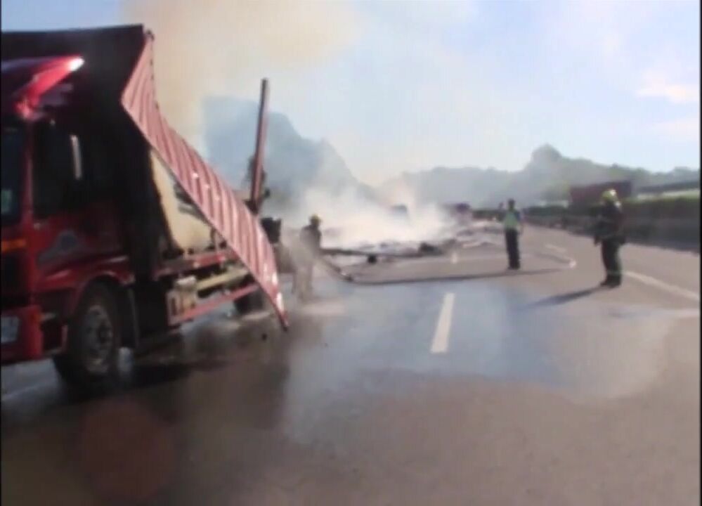 Truck Catches Fire After Colliding With Parked Vehicle