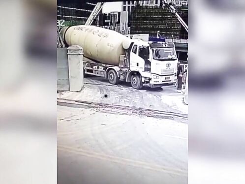 Horror: Concrete Mixer Plunges Into Huge Hole With Driver