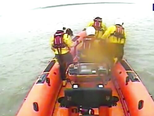 Lifeboat Crew Rescues Woman Who Can't Swim From Rooftop