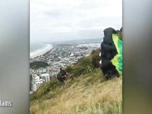 The Paraglider Was Thrown Into The Air And Fell Back To The Ground Dramatically