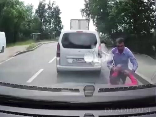 Useless Idiot Runs In Front Of Car Without Looking