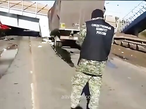 Dump Truck Driver Forgets To Lower The Truck Body