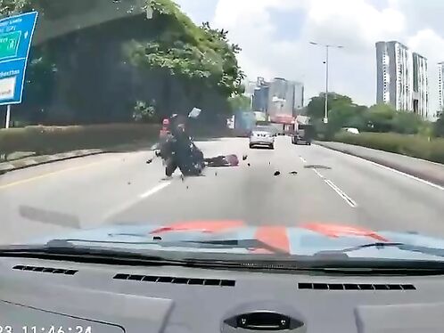 Bicyclist Hit By Spinning Tire