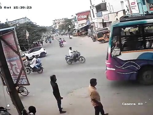 An Elderly Man Fell Under The Wheels Of A Bus Wearing A Sweater