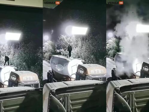 The Driver Climbed Onto The Tanker To Take Samples