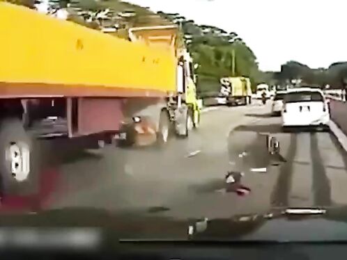The Moment The Motorcyclist Fell Under The Wheels Of A Tractor
