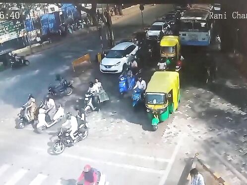 Indian Woman Hits Bus Due To Inattention