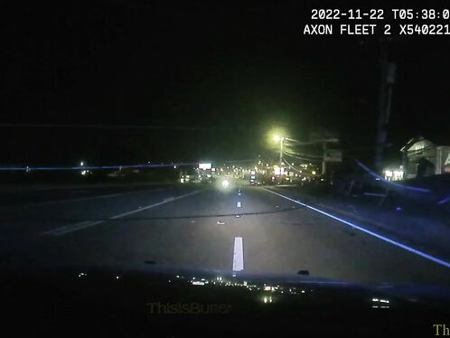 Semi Truck Drives Over Downed Power Lines, Nearly Hits Police Officer