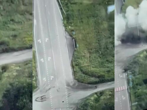 Russian Soldier Hit By Explosion While Crossing Road