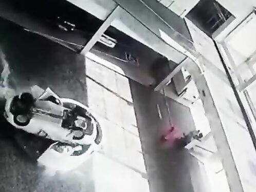 Woman Crushed To Death By Falling Car