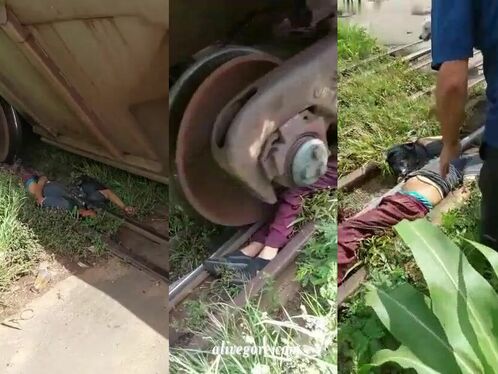 An Idiot Tried To Cross The Tracks Under A Moving Train.