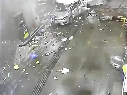 E Car Explodes At Moder Gas Station