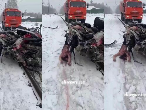 A Truck Tows A Car Full Of Dead Bodies After It Was Hit By A Train