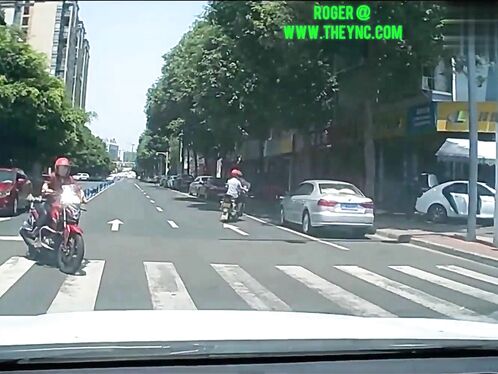 A Motorcycle Hit A Man Riding A Motorcycle In Meishan City