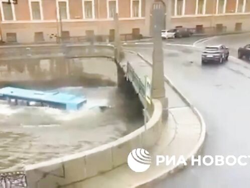Russia. A Bus Falls Off A Bridge In St. Petersburg
