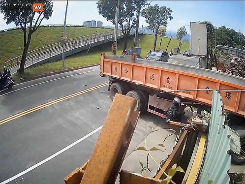 Motorcyclist Hits Semi-trailer Truck While Turning Right