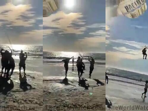 Paragliding On The Beach