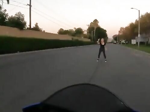 Crazy Karen Tries To Stop A Motorcycle With Her Feet
