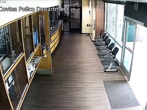 Mad Man With Bat In Police Station