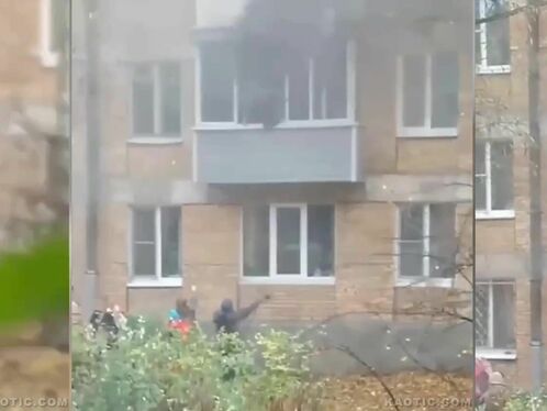 Woman Jumps From Burning Building