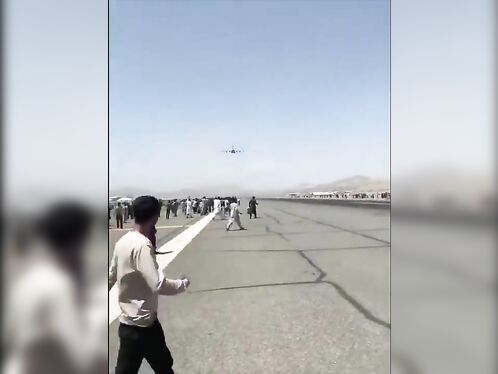 Afghani Struggled To Climb Aboard The Plane As It Took Off