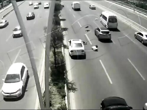 A Man Crosses The Highway