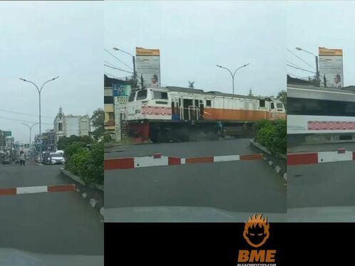 Cyclist Falls While Crossing In Front Of Train
