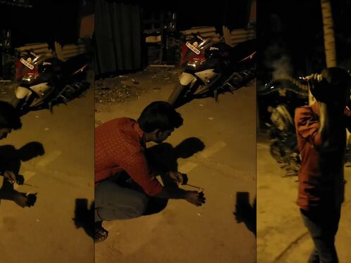 Idiot Uses Fuse To Light Firecrackers And Holds Firecrackers