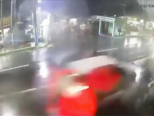 Two Girls In Vietnam Share An Umbrella