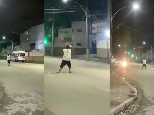 Tried To Push Down A Man Who Was Dancing In The Middle Of A Street In Brazil.