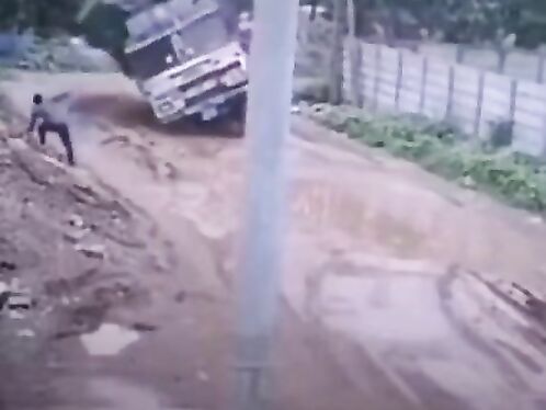 Truck Overloaded And Turning