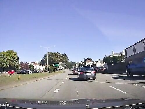 All 3 Lanes Go To The Center And Then Turn Right Onto The Same Road