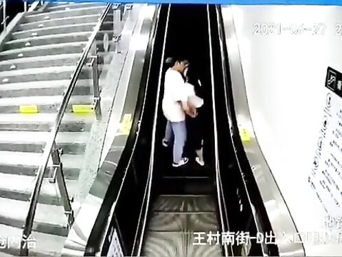 Kissing On The Escalator
