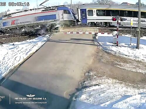 Poland: Car Collides With Moving Train