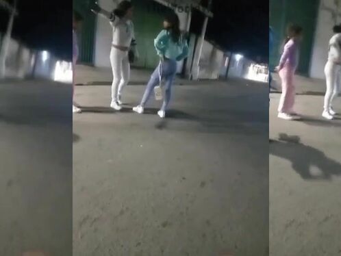 Mother Arguing With Another Girl In The Middle Of The Street