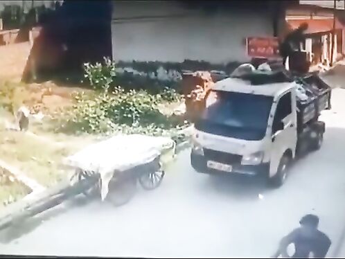 The Garbage Man Forgets About The Overhead Lines And Enjoys